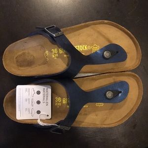 Size 36 shiny blue Birkenstocks.